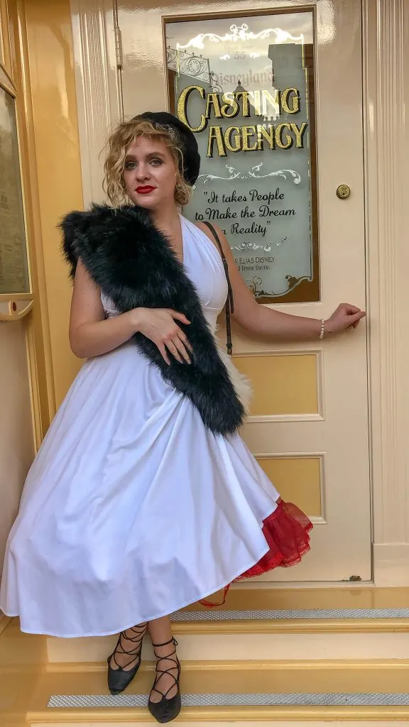 Adults playing dress up at Disneyland by Disneybounding! Adults can wear stylish every day clothes inspired by a Disney character. Here is an example for Disneybounding as Cruella de Vil.