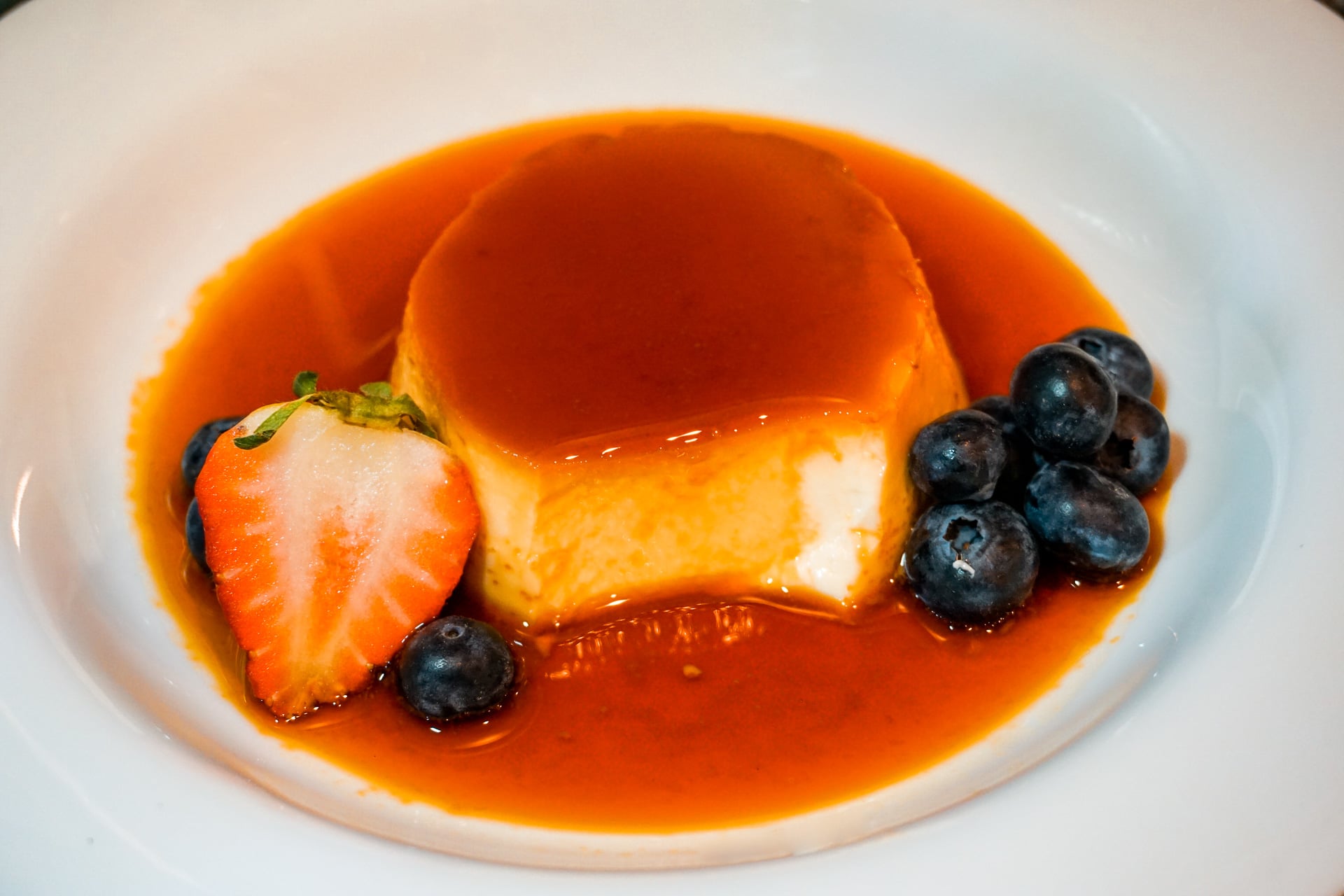 https://www.oursweetadventures.com/wp-content/uploads/2020/04/Flan-with-Berries-2.jpg