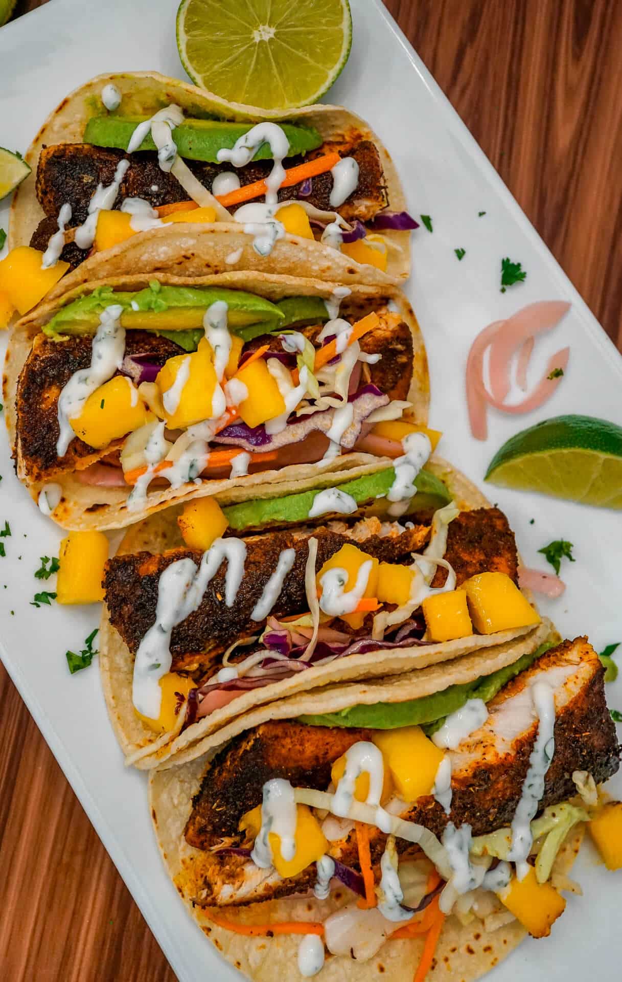 The Ultimate Blackened Fish Tacos with Mango Slaw