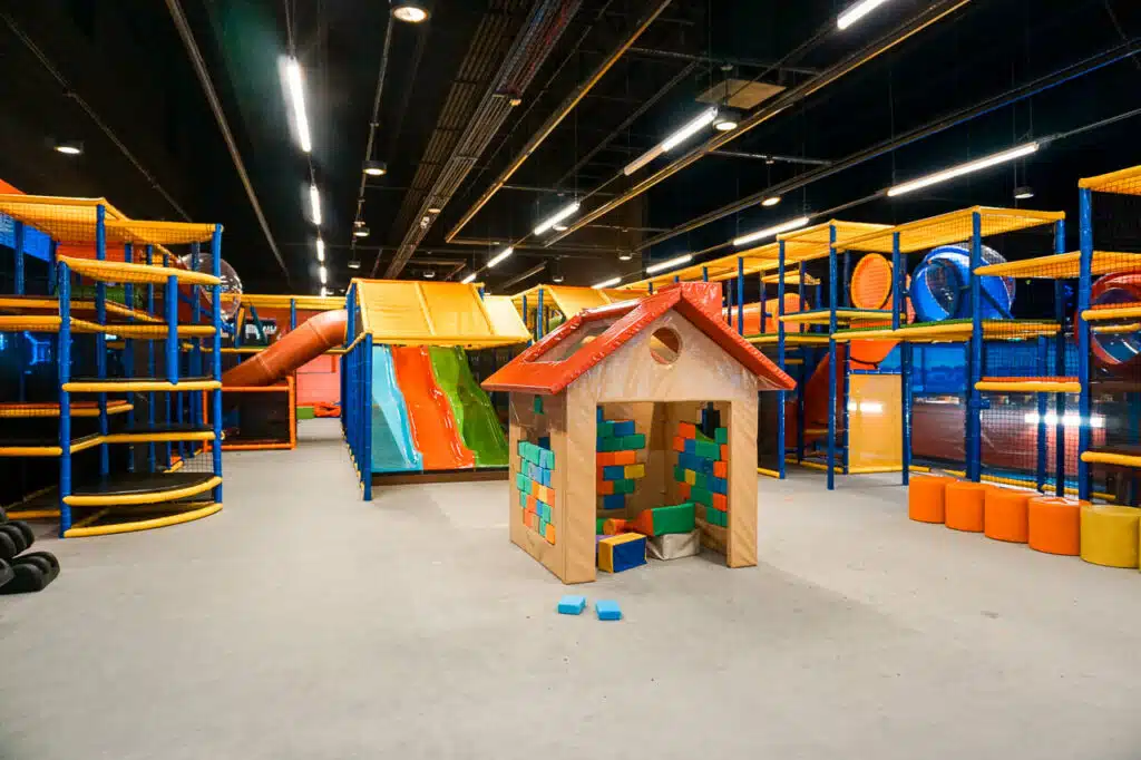 A yellow and blue indoor playground in Dallas at Round1.