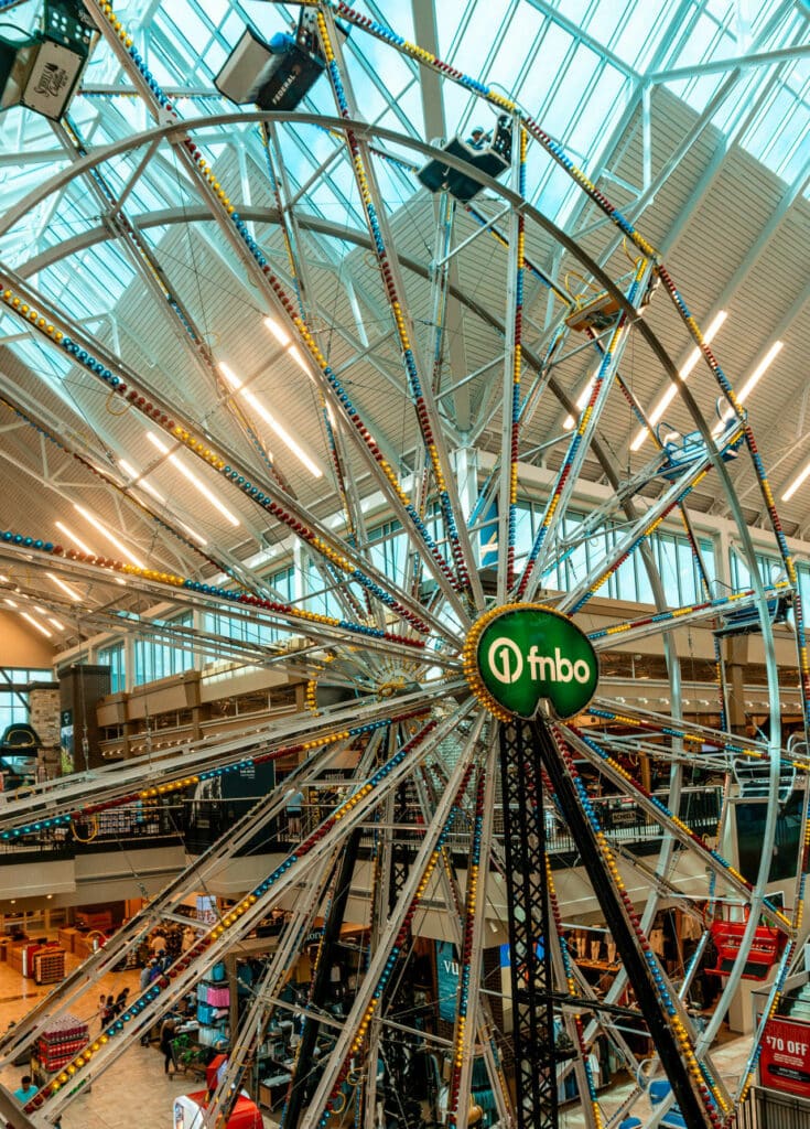A 65-foot indoor Ferris wheel inside SCHEELS sporting goods store.