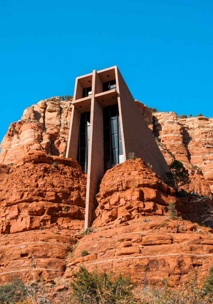 The Chapel at the Holy Cross built into red rock buttes in Sedona—a must visit in your Sedona Itinerary.