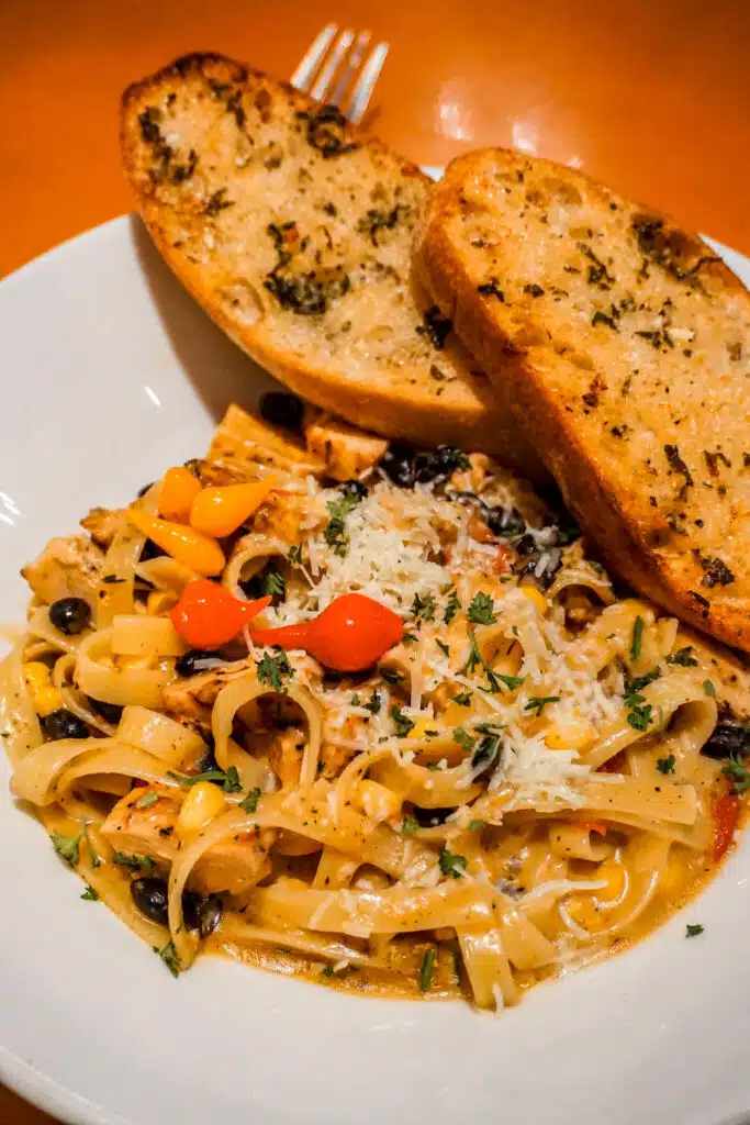 A bowl of fettuccine Southwestern pasta with chicken, black beans, and corn from The Hudson in Sedona.